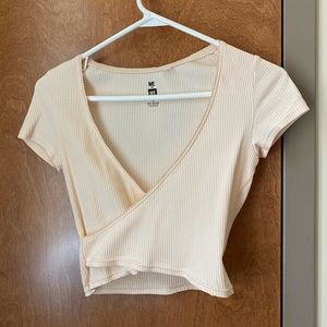 Pale yellow wrap crop top
